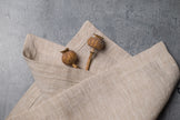 Natural Beige linen fabric close-up with mitered hem corner – CoolLinen color 46. Natural Beige