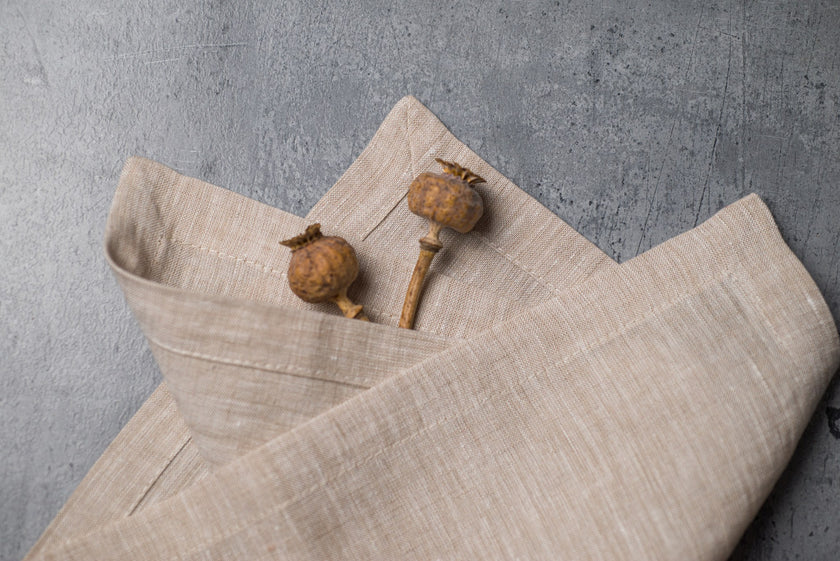 Natural Beige linen fabric close-up with mitered hem corner – CoolLinen color 46. Natural Beige