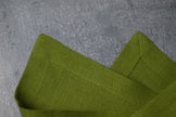Pear linen fabric close-up with mitered hem corner – CoolLinen color 54. Pear