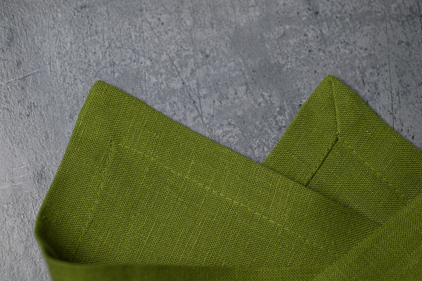 Pear linen fabric close-up with mitered hem corner – CoolLinen color 54. Pear