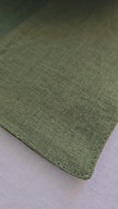 Green shade linen placemats made from natural flax, zero-waste table linens for eco-friendly table styling.